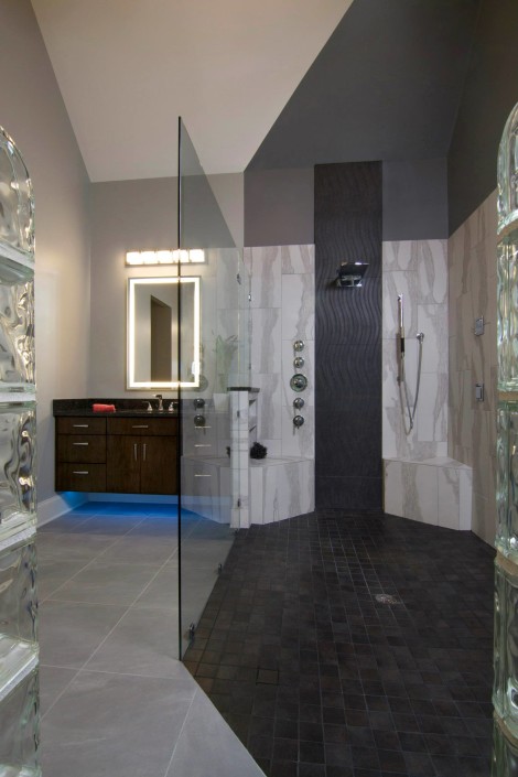 Bathroom vanity with floor lighting Alcorn's Custom Woodworking